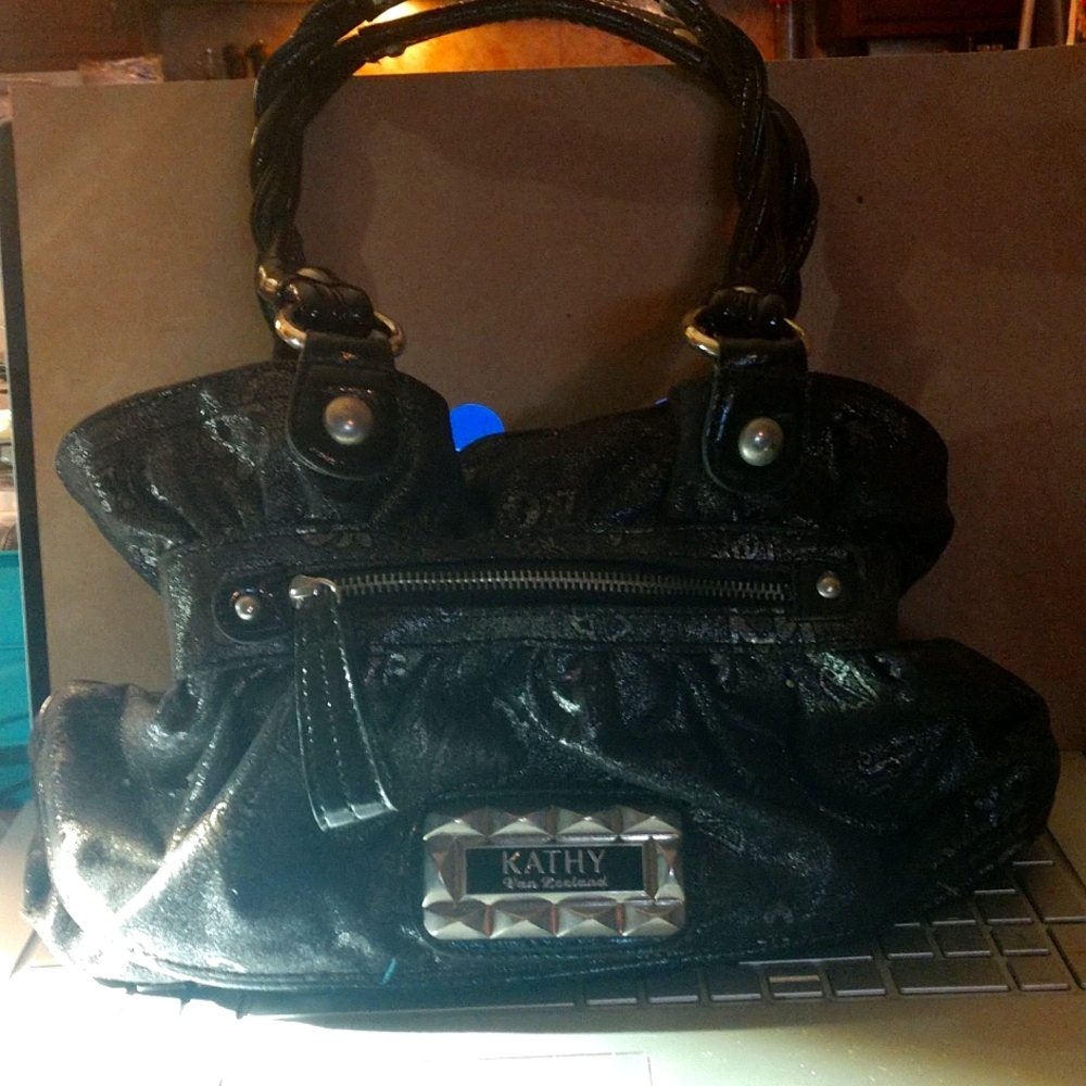 Kathy purse with beautiful blue and white lining never used